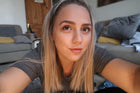 Natasha, the owner of Timeless Aromas, shares her journey in 'How I started my home fragrance business' while smiling at the camera. Learn how to start a candle business with tips and insights from her experience in candle making and creating wax melts.