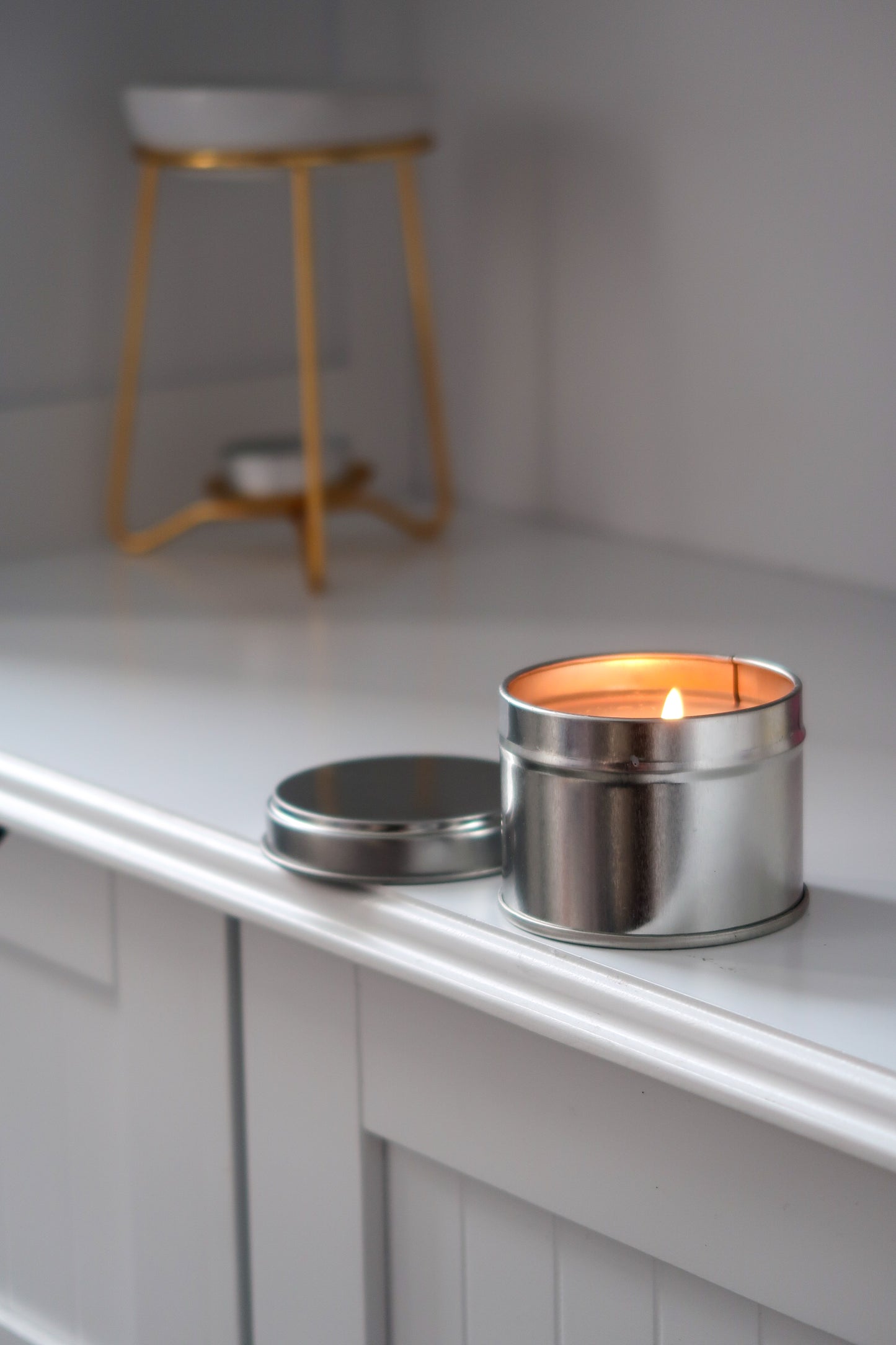 Inviting 100g Silver Tin Candle by Timeless Aromas Ltd, showcasing its warm glow. This hand poured candle is perfect for home fragrance and gifting. Available in a pack of 6, it’s an excellent choice for those interested in blank candles or white label candles for businesses.