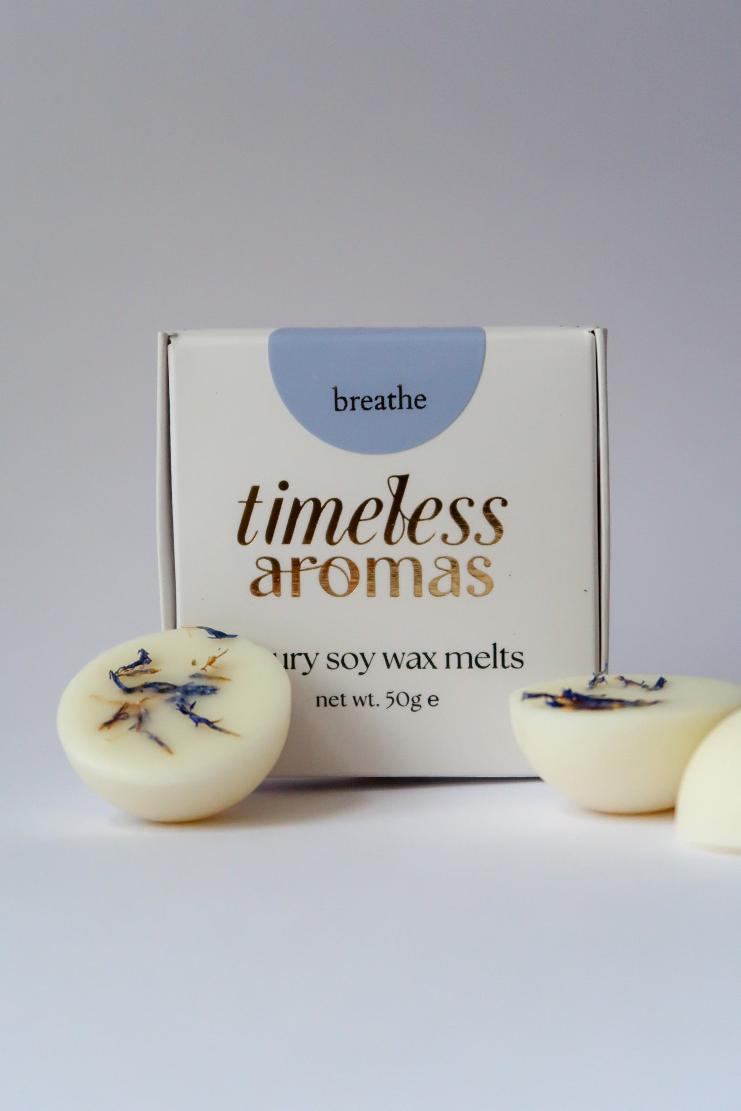 Timeless Aromas Breathe Wax Melt Box featuring luxury soy wax melts, beautifully presented with floral accents, perfect for home fragrance.
