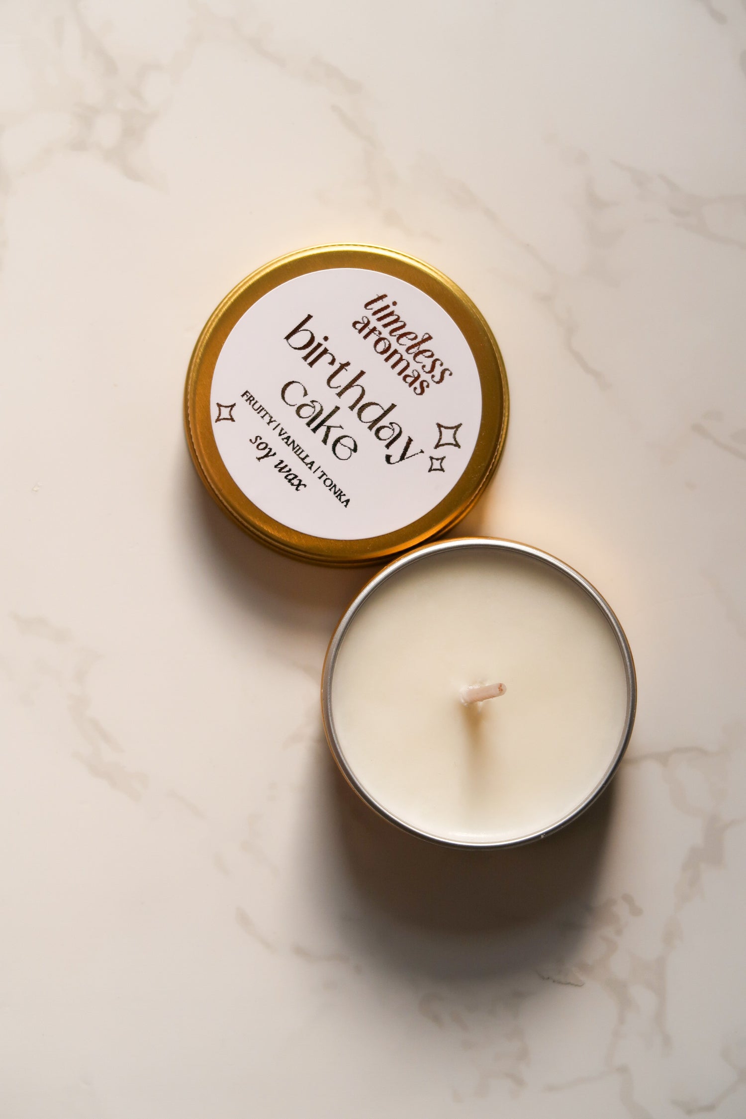 Birthday Cake Mini Gold Tin Candle by Timeless Aromas Ltd, featuring a hand-poured soy wax with a clean bur, 30g, mini tin candles, birthday candles, and happy birthday candles.