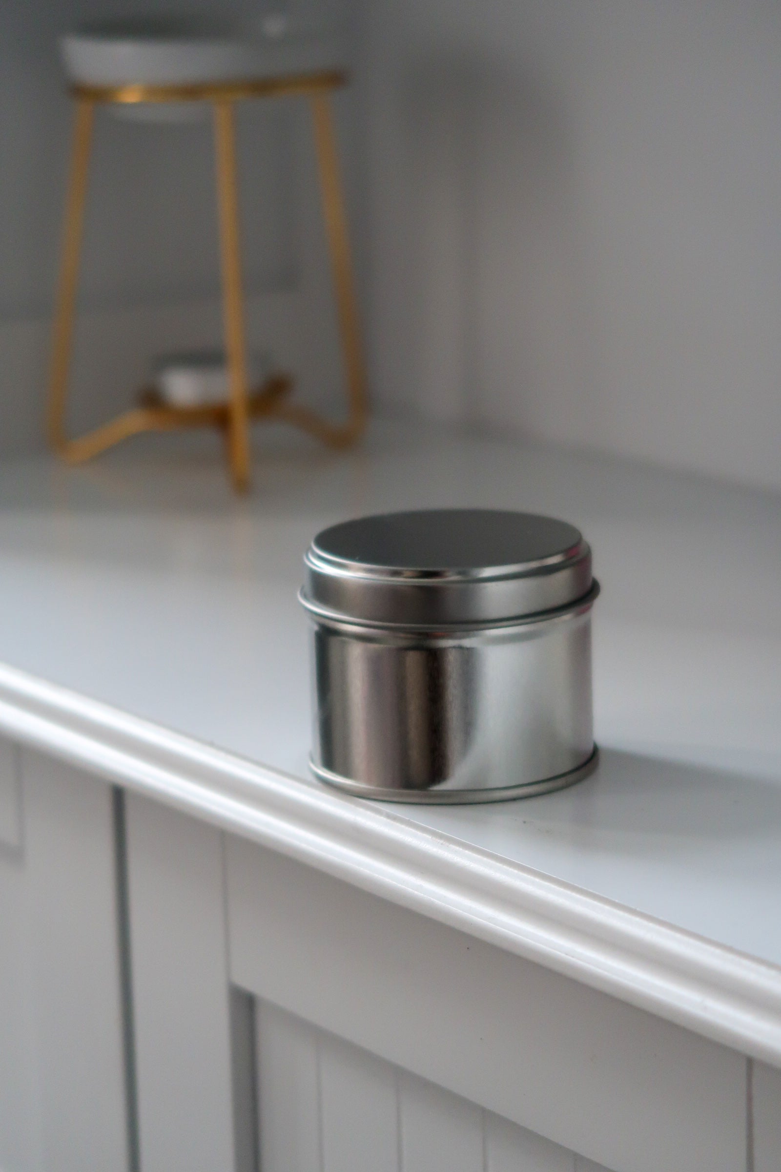 Elegant 100g Silver Tin Candle by Timeless Aromas Ltd, featuring a blank label design. This hand poured candle is great for personal use or as a gift, part of a pack of 6, and fits perfectly into any home fragrance setting. A fantastic choice for wholesale white label candles.