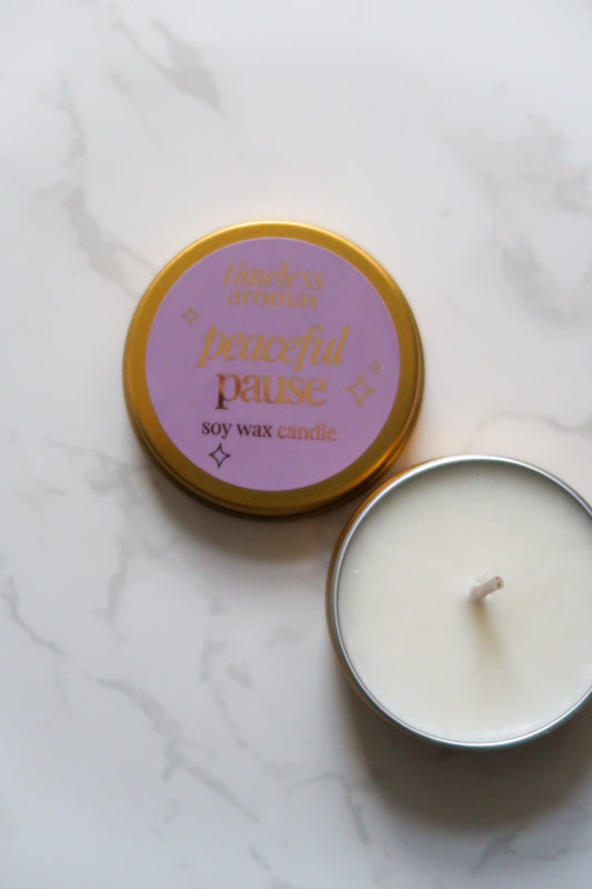 Timeless Aromas Ltd Peaceful Pause Mini Gold Tin Candle showcasing its elegant design with a sleek gold tin and calming fragrance.