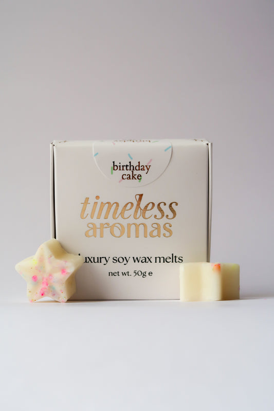 Timeless Aromas Birthday Cake Wax Melt Box featuring luxury soy wax melts shaped like stars, perfect for adding a sweet birthday cake scent to your home.