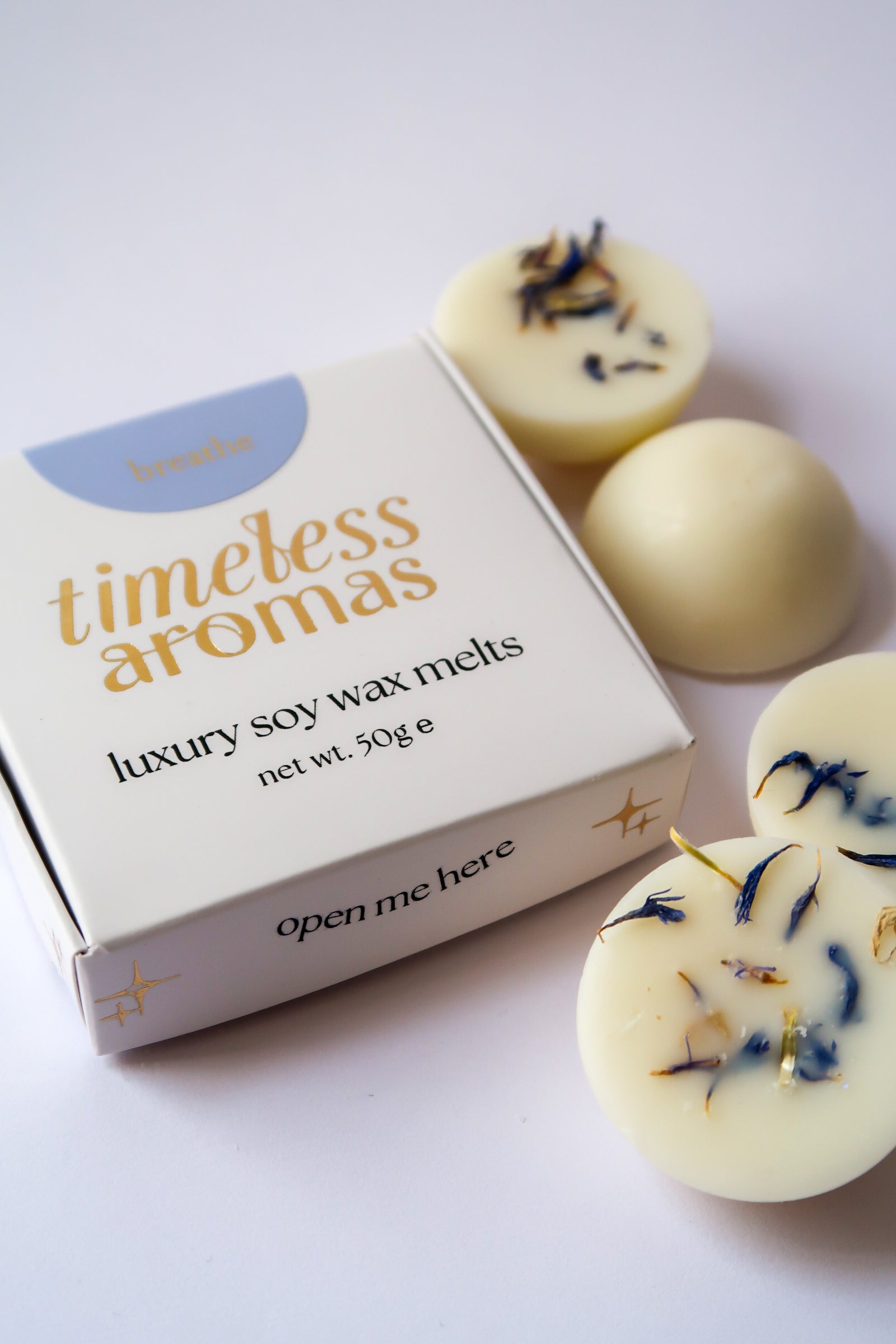 Timeless Aromas Breathe Wax Melt Box featuring luxury soy wax melts, beautifully presented with floral accents, perfect for home fragrance.