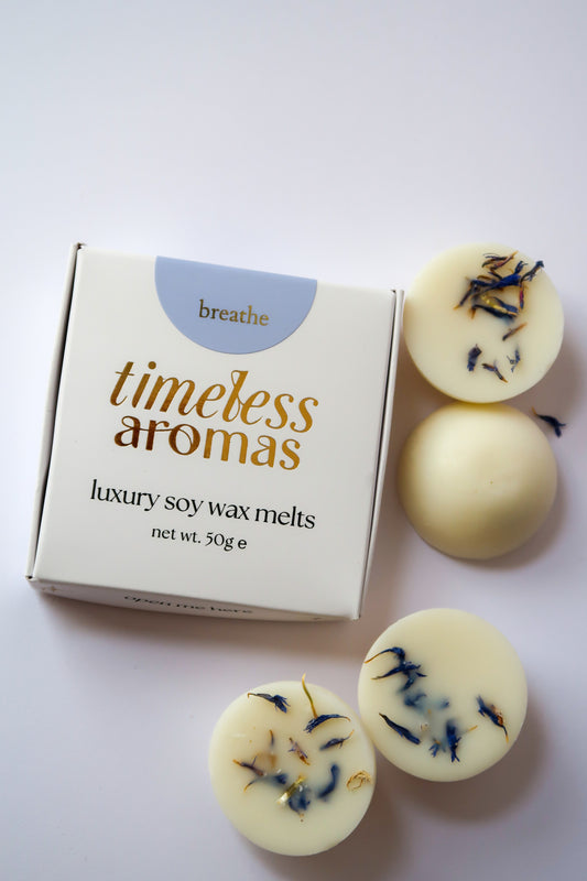 Timeless Aromas Breathe Wax Melt Box featuring luxury soy wax melts, beautifully presented with floral accents, perfect for home fragrance.